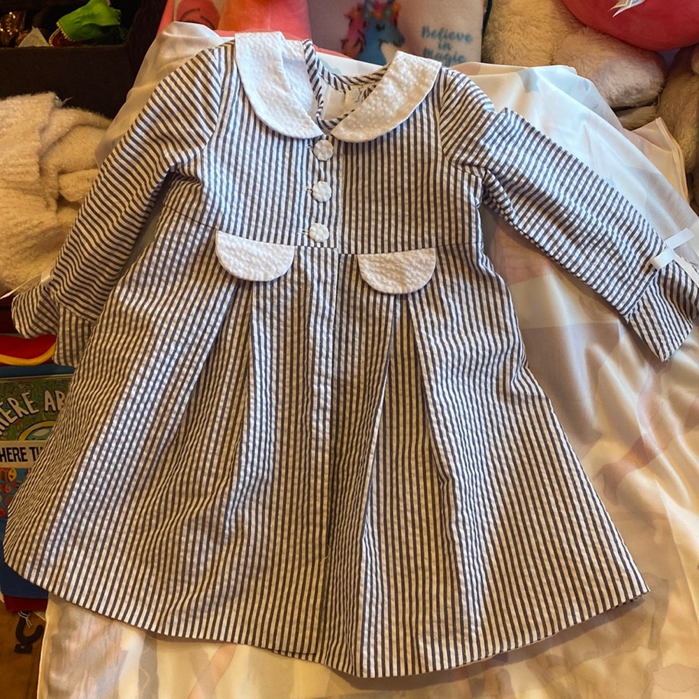 Girls 2-piece dress and jacket. Light blue stripped. $15